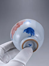 Load image into Gallery viewer, 110ml Qinghua and Youlihong Bird Moon White Ruyao Yashou Teacup 青花釉里红花鸟月白汝窑压手杯
