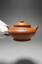 Load image into Gallery viewer, Zhuni Xubian Shuiping Yixing Teapot with Inscription 朱泥虚扁水平带刻底 120ml