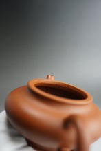 Load image into Gallery viewer, Zhuni Xubian Shuiping Yixing Teapot with Inscription 朱泥虚扁水平带刻底 120ml