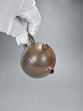 Load image into Gallery viewer, 120ml Dragon Egg Nixing Teapot with Yaobian by Li Wenxin 李文新泥兴阴阳龙蛋