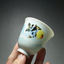 Load image into Gallery viewer, Lionhead Fish Falangcai Porcelain Teacup 珐琅彩江山游金鱼小花神杯 60ml