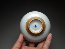 Load image into Gallery viewer, 60ml Hand Painted Goldfish Moon White Ruyao Flat Teacup 汝窑月白金鱼扁杯