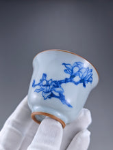 Load image into Gallery viewer, 75ml Qinghua Magnolia Moon White Ruyao Bell Teacup 汝窑青花手绘花卉