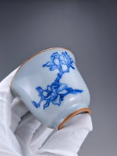 Load image into Gallery viewer, 75ml Qinghua Magnolia Moon White Ruyao Bell Teacup 汝窑青花手绘花卉