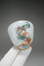 Load image into Gallery viewer, Fencai Hand Painted Peacock Moon White Ruyao Teacup 粉彩孔雀杯 75ml
