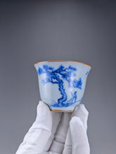 Load image into Gallery viewer, 80ml Qinghua Pine Tree Moon White Ruyao Bell Teacup 汝窑青花手绘松树