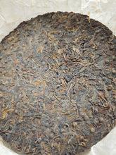 Load image into Gallery viewer, 2002 Zhongcha Kunming Tea Factory 8668 RED STAMP IRON CAKE 红印铁饼