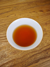 Load image into Gallery viewer, 2002 Zhongcha Kunming Tea Factory 8668 RED STAMP IRON CAKE 红印铁饼