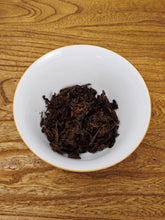 Load image into Gallery viewer, 2002 Zhongcha Kunming Tea Factory 8668 RED STAMP IRON CAKE 红印铁饼