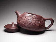 Load image into Gallery viewer, Lao Zini Pinggai Shipiao Yixing Teapot with Carvings of a Village 老紫泥平盖石瓢 带浮雕刻绘(江南水乡)220ml