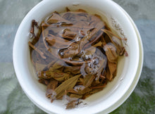 Load image into Gallery viewer, 2015 Spring Tianming Long Pa Village YOU LE MOUNTAIN Ancient Tree Raw Pu'er Tea Cake