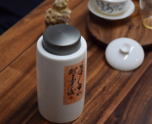 Load image into Gallery viewer, Tall Blanc de Chine Porcelain Tea Caddy with Calligraphy (Titanium Alloy Lid), 560ml