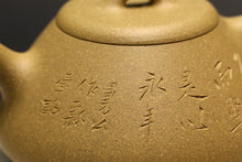 Load image into Gallery viewer, Benshan duanni 本山段泥 ManSheng Shipiao Yixing Teapot with Carvings 不肥而坚是以永年, 200ml