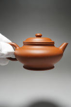 Load image into Gallery viewer, Zhuni Xubian Shuiping Yixing Teapot with Inscription 朱泥虚扁水平带刻底 120ml
