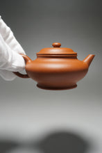 Load image into Gallery viewer, Zhuni Xubian Shuiping Yixing Teapot with Inscription 朱泥虚扁水平带刻底 120ml
