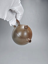 Load image into Gallery viewer, 120ml Dragon Egg Nixing Teapot with Yaobian by Li Wenxin 李文新泥兴阴阳龙蛋
