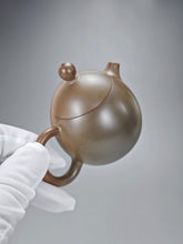 Load image into Gallery viewer, 120ml Dragon Egg Nixing Teapot with Yaobian by Li Wenxin 李文新泥兴阴阳龙蛋
