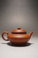 Load image into Gallery viewer, Zhuni Xubian Shuiping Yixing Teapot with Inscription 朱泥虚扁水平带刻底 120ml
