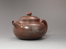 Load image into Gallery viewer, Fanggu Nixing Teapot with Carvings of Blossoms by Li Changquan 黎昌权坭兴仿古带刻 125ml
