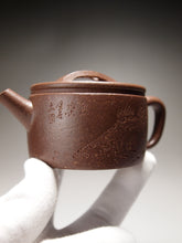 Load image into Gallery viewer, Fully Handmade Lao Duanni Hanwa Yixing Teapot with Fish Carving by Wang Kaili 全手工王凯丽制老段泥鱼乐汉瓦 150ml
