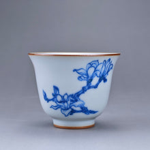 Load image into Gallery viewer, 75ml Qinghua Magnolia Moon White Ruyao Bell Teacup 汝窑青花手绘花卉
