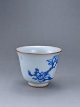 Load image into Gallery viewer, 75ml Qinghua Magnolia Moon White Ruyao Bell Teacup 汝窑青花手绘花卉
