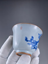 Load image into Gallery viewer, 75ml Qinghua Magnolia Moon White Ruyao Bell Teacup 汝窑青花手绘花卉
