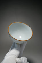 Load image into Gallery viewer, Fencai Hand Painted Birds on a Branch Moon White Ruyao Teacup 粉彩琵琶鸟杯 75ml
