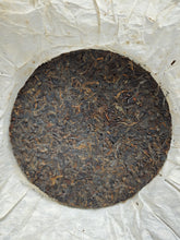 Load image into Gallery viewer, 2002 Zhongcha Kunming Tea Factory 8668 RED STAMP IRON CAKE 红印铁饼
