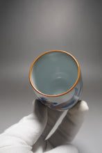 Load image into Gallery viewer, 90ml Qinghua Goldfish Moon White Ruyao Teacup 月白青花金鱼杯
