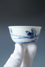 Load image into Gallery viewer, 85ml Qinghua Plum Blossoms and Birds Porcelain Teacup by KuangShi 青花匡石手绘梅花三鸟杯
