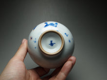 Load image into Gallery viewer, 120ml Qinghua Duck in the Water Moon White Ruyao Teacup, 青花月白汝窑茶杯
