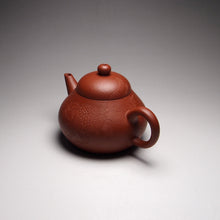 Load image into Gallery viewer, Zhuni Pear Shuiping Yixing Teapot with Carving of Lionhead Goldfish 朱泥梨式水平带刻绘 120ml
