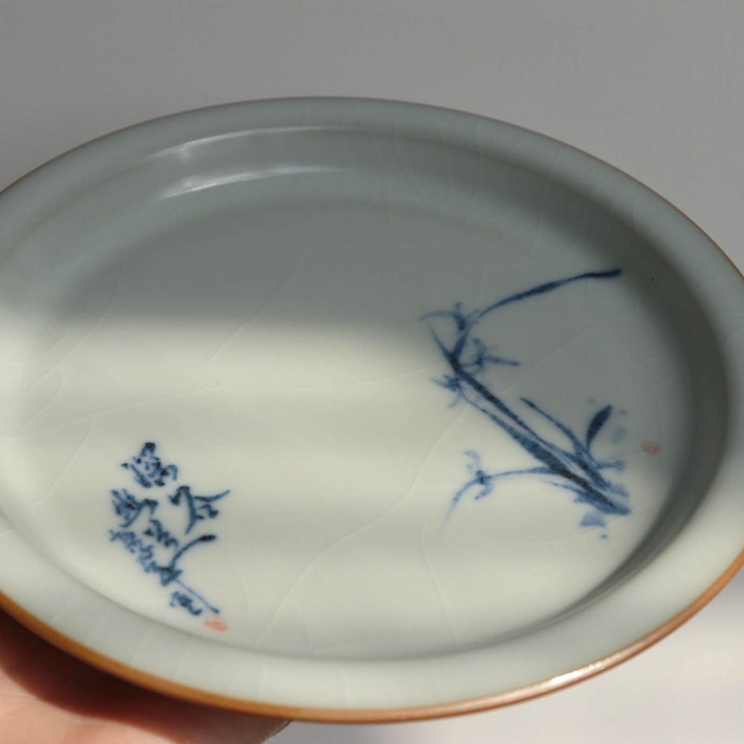 Moon White Ruyao Saucer with Orchids 月白汝窑壶承